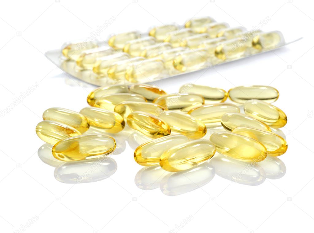 fish oil capsules and blister pack isolated on white background