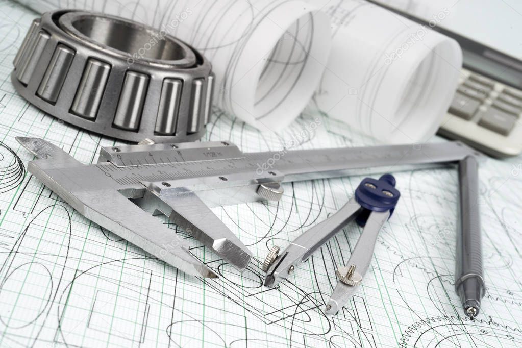 roller bearing, vernier callipers , calculator, compasses, technical pen and drawings 