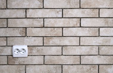 Elektrik soketine ve duvar. A yakın çekim