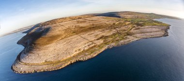 Aerial birds eye view of the burren national park. scenic tourism landscape for Unesco World Heritage site and global geopark geotourism along the wild atlantic way. clipart
