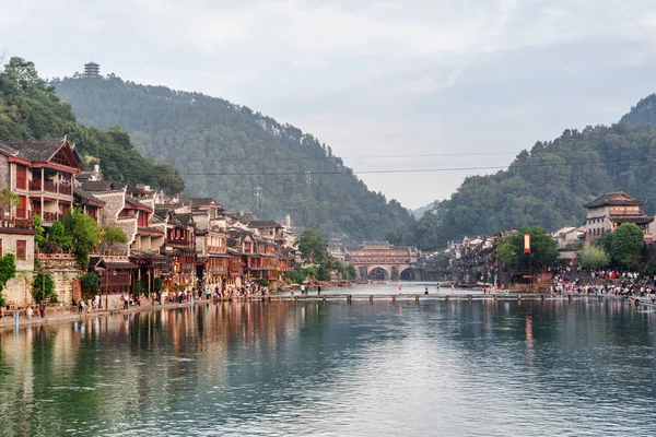 Amazing view of Phoenix Ancient Town (Fenghuang County) and the Tuojiang River (Tuo Jiang River) in China. Fenghuang is a popular tourist destination of Asia.