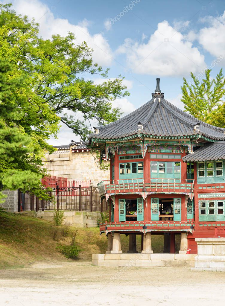 Colorful octagonal two-story pavilion Parujeong of Jibokjae Private Royal Library at Gyeongbokgung Palace in Seoul, South Korea. Wonderful building of traditional Korean architecture.