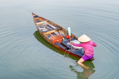 Onu balık ağı, Hoian kontrol Vietnamlı kadın Olağandışı görünümü