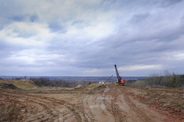 Kırmızı kil ocağı Ekskavatör