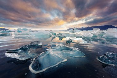 Icebergs in Jokulsarlon glacial lagoon clipart