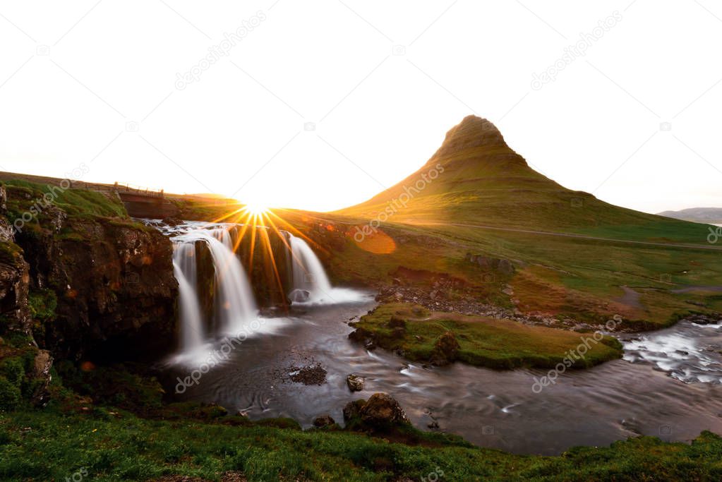 Colorful sunrise on Kirkjufellsfoss waterfall