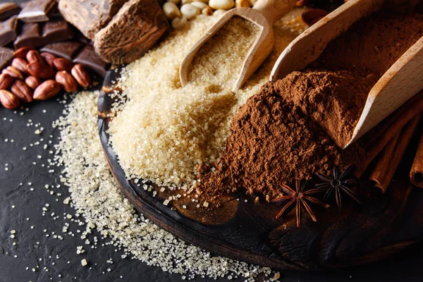 Cacaopoeder, chocolade, noten en specerijen — Stockfoto