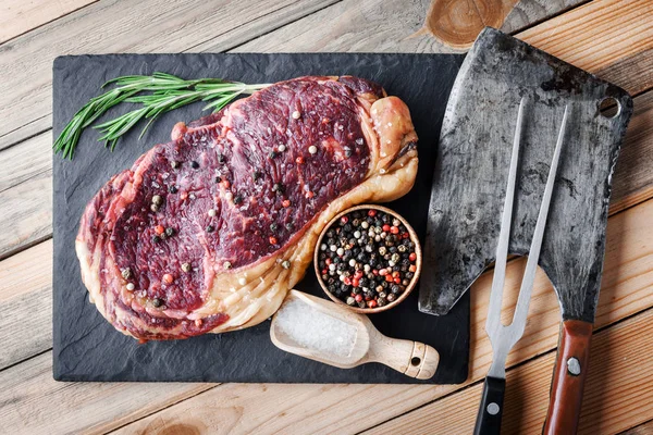 Marbling ribeye steak on wooden board — Stock Photo, Image