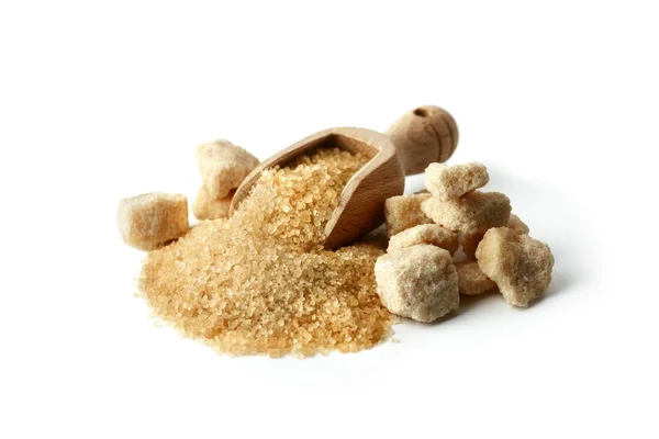 Brown cane sugar crystals in wooden scoop — Stock Photo, Image