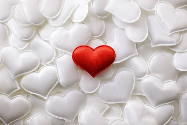 Red textile heart on white hearts background — Stock Photo, Image