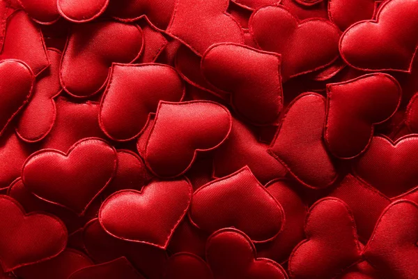 Röd textil hjärtan närbild — Stockfoto