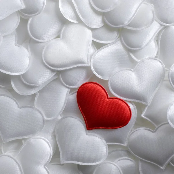 Red textile heart on white hearts background — Stock Photo, Image