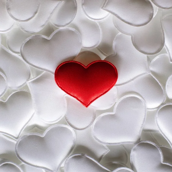 Red textile heart on white hearts background — Stock Photo, Image