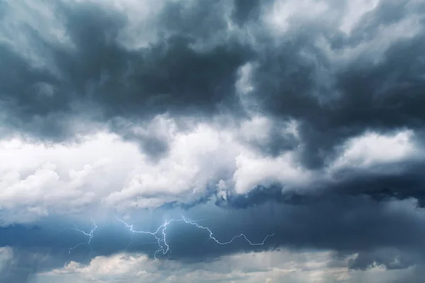 Dramatic storm clouds with rain — Stock Photo, Image