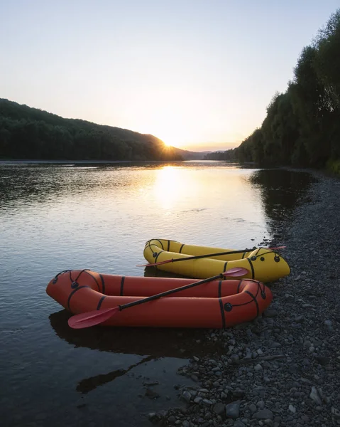 Orange and yellow packrafts rubber boats — Stock Photo, Image