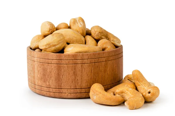 Fried cashew in wooden plate on a white, isolated. — Stock Photo, Image