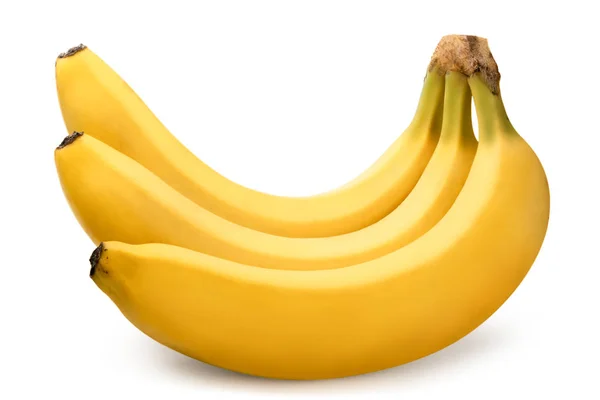 Três bananas maduras em um fundo branco . — Fotografia de Stock