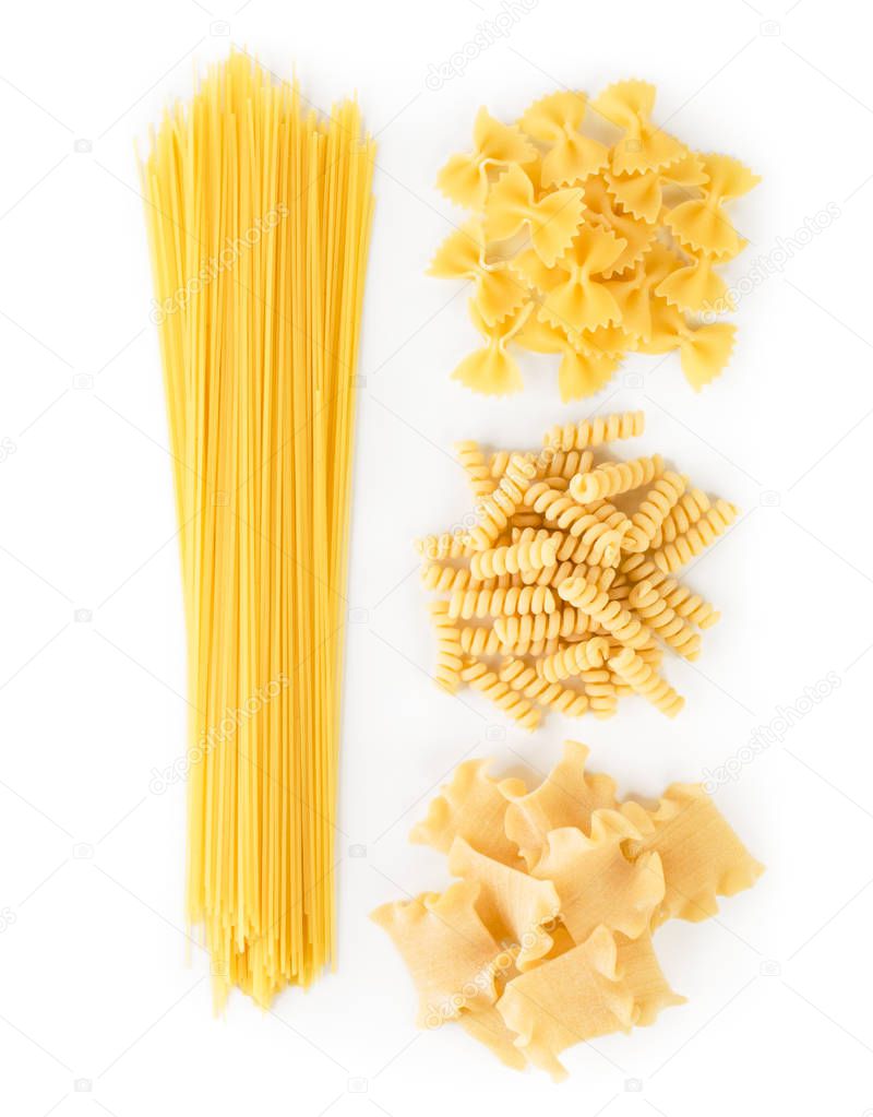 A set of spaghetti and pasta on a white. The view from the top
