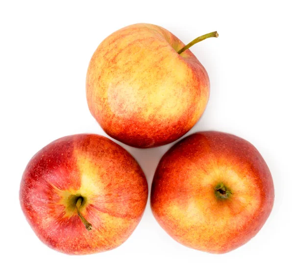 Tres manzanas maduras sobre un blanco. La vista desde arriba . — Foto de Stock