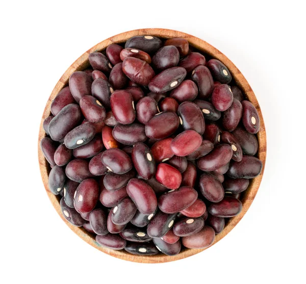 Red beans in wooden plate on a white. The view from the top. — Stock Photo, Image