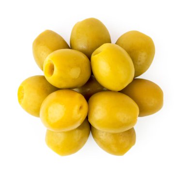 Bir yığın üzerinde beyaz bir yeşil zeytin. Üstten görünüm.