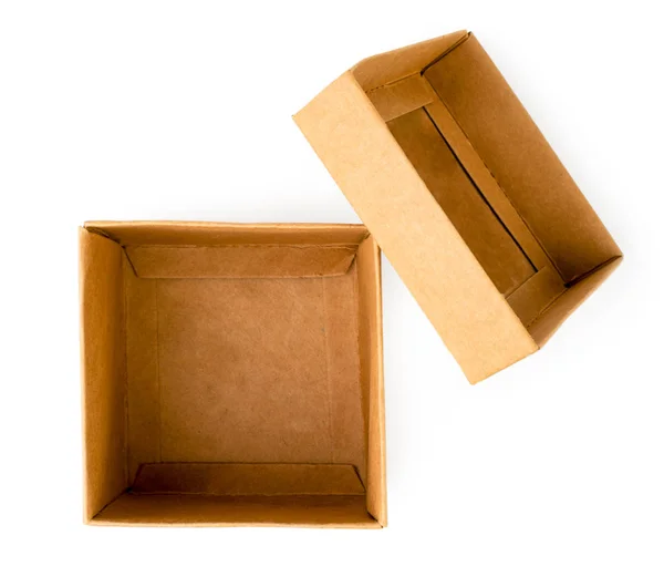 Karton kutu ve üzerinde beyaz bir kapak. Üst formu. — Stok fotoğraf