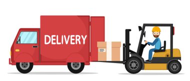 Forklift yükü kamyonun içine beyaz koyar.
