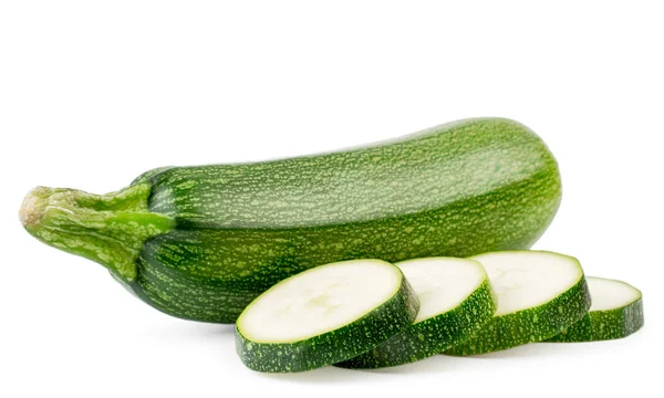 Courgettes fraîches et tranches tranchées se referment sur un blanc. Isolé . — Photo