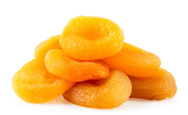Heap of dried apricots closeup on a white. Isolated. — Stock Photo, Image