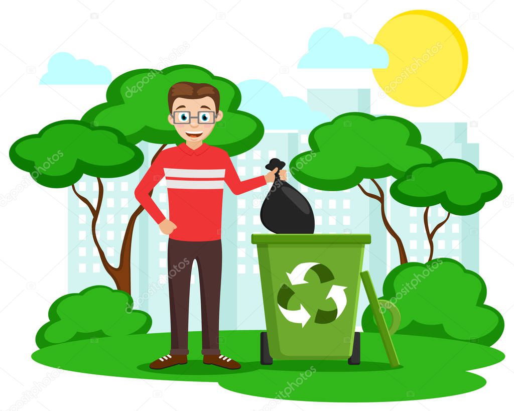 Man throws a black bag in the trash on the background of nature. Ecology