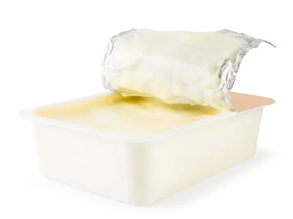 Ömlesztett sajt egy doboz zár - megjelöl, fehér. Elszigetelt. — Stock Fotó