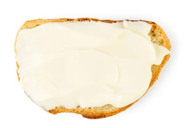 Eritilmiş peynir ekmek üzerine yayıldı. Üstten Görünüm. — Stok fotoğraf