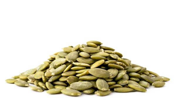 Heap of pumpkin seeds on a white background. Isolated. — Stock Photo, Image