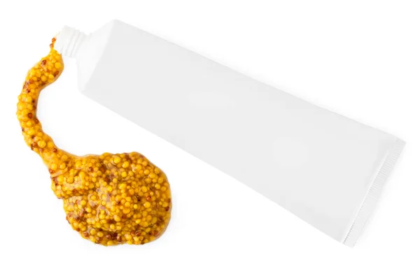 Tubo di semi di senape su un bianco. La forma della parte superiore . — Foto Stock