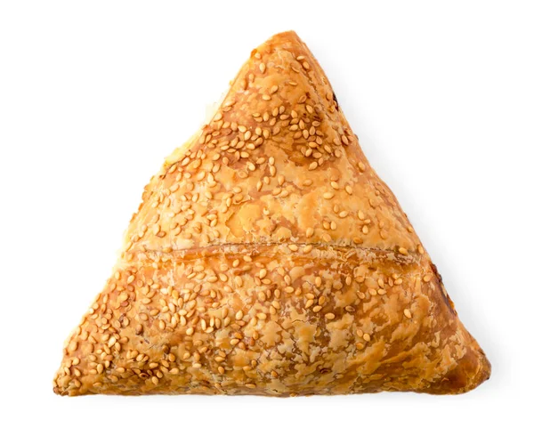 Triangular bun with sesame seeds on a white. The form of the top. — Stock Photo, Image