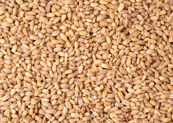 Pearl barley background. The form of the top. — Stock Photo, Image