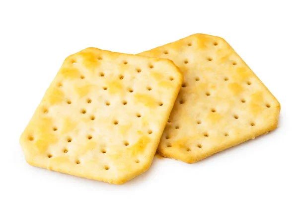 Zwei Cracker-Kekse in Großaufnahme auf einem weißen. isoliert. — Stockfoto