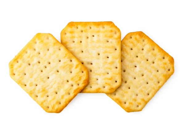 Drei Cracker-Kekse auf weißem Hintergrund. die Form des Kreisels. — Stockfoto