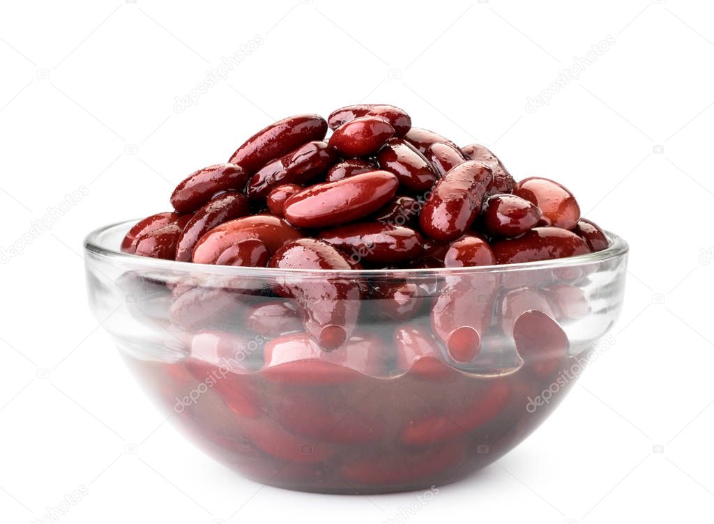 Canned red beans in a glass plate close-up on a white. Isolated.