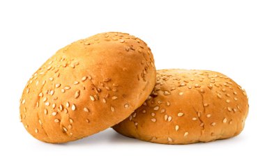 Beyaz Susam tohumları ile iki çörekler. Izole.