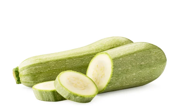 Zucchine e metà con fette affettate primo piano su un bianco. Isolato — Foto Stock