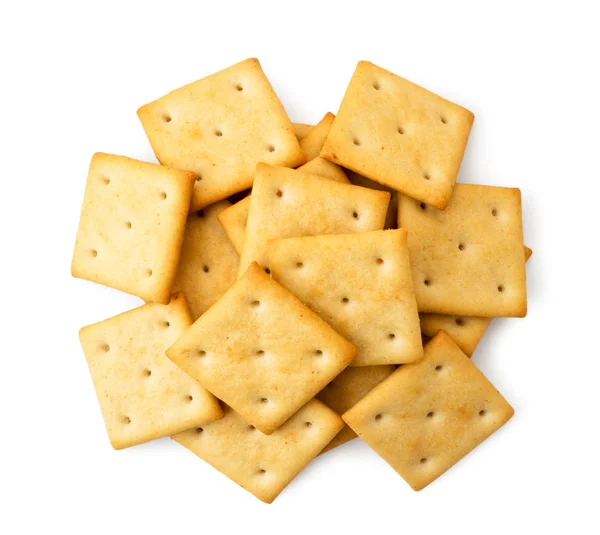 Stapel crackers op een witte achtergrond. Het uitzicht op de top. — Stockfoto