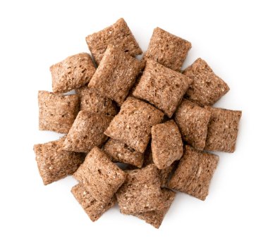 Beyaz arka plan üzerine kahvaltı pedleri yığını. Üst görünümü.