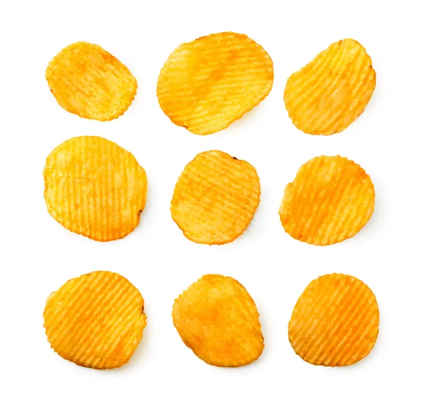 Uppsättning korrugerade chips på en vit. Utsikten över toppen. — Stockfoto