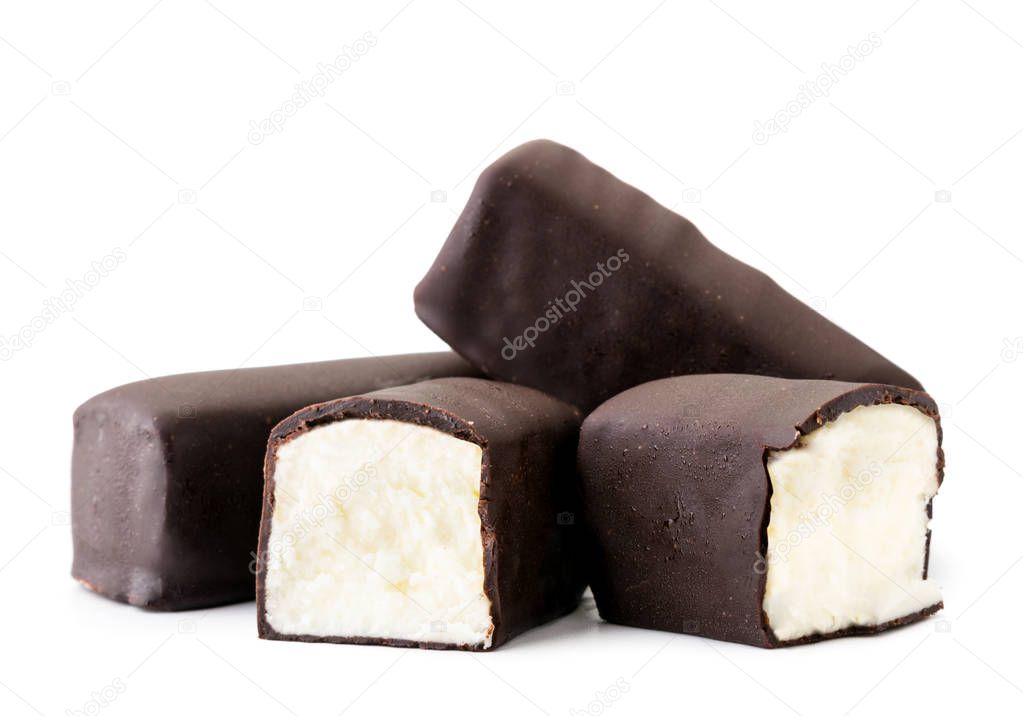 Glazed curd in chocolate and two halves on a white, isolated.