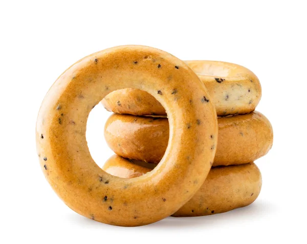 Bagels com sementes de papoila close-up em um fundo branco . — Fotografia de Stock