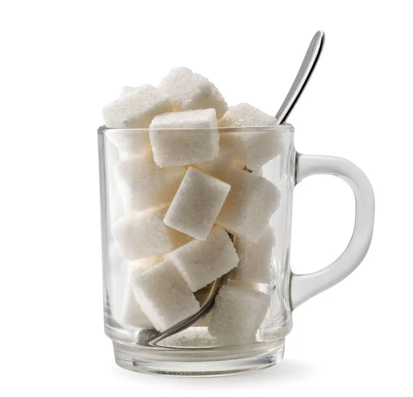 Geraffineerde suiker in een glas met lepel op een witte, geïsoleerde. — Stockfoto