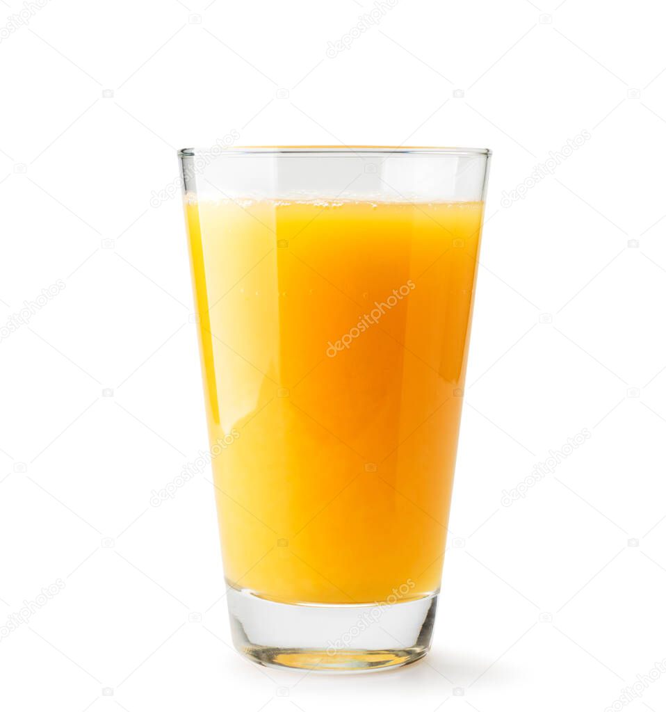 Orange juice in a glass close-up on a white. Isolated