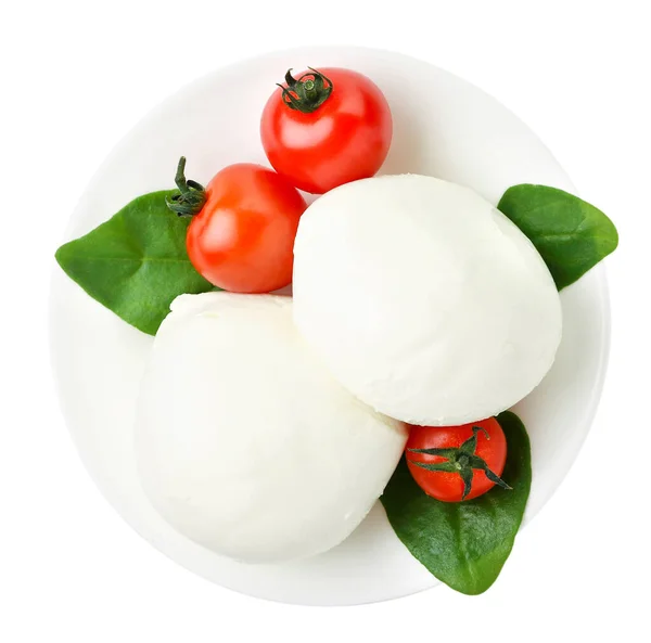 Mozzarella, Kirschtomaten und Spinatblätter in Großaufnahme auf weißem Hintergrund. Der Blick von oben — Stockfoto