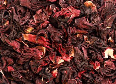 Hibiscus çayı, yakın plan, amber çiçeği arka plan. Yukarıdan görünüm